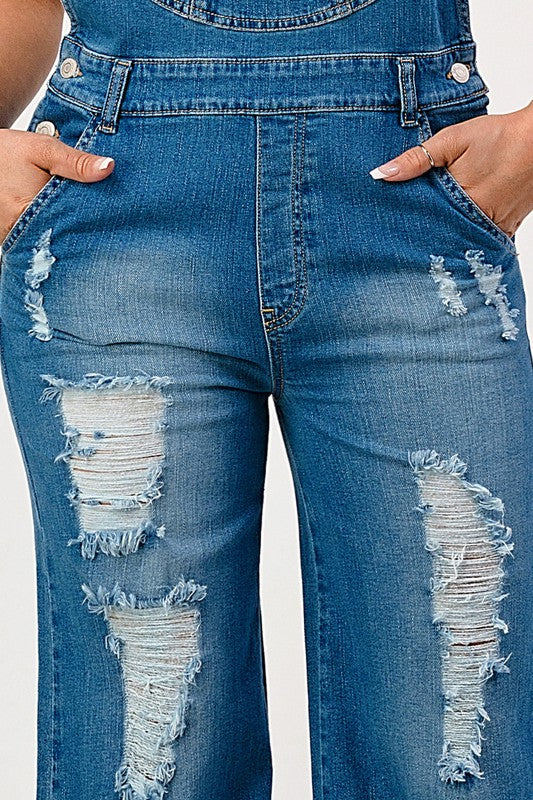 JEANS: STRETCH DISTRESSED EXTRA FLARED LEG DENIM OVERALLS